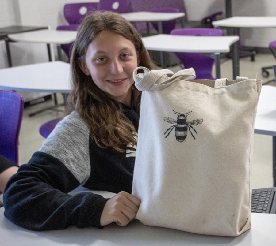 Danni Fritz with her bag from a farmers market.