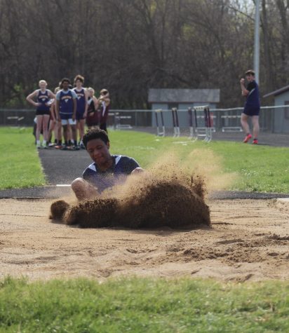 Antwon Hicks competes in the long jump. 