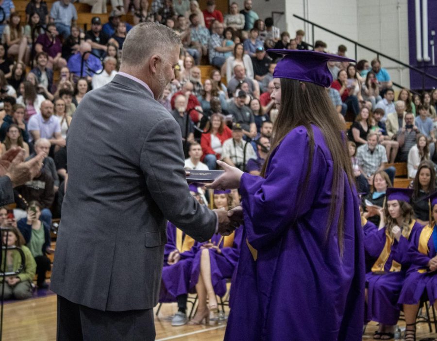 Caylin Bell receiving her diploma