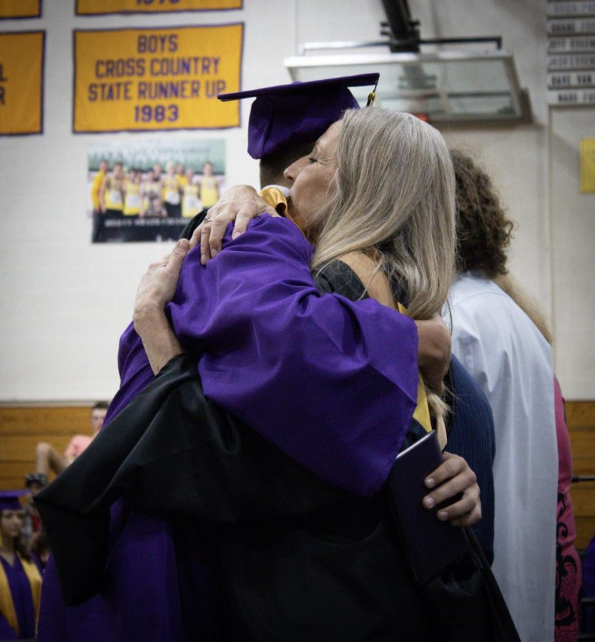 Lewis Fritz and Mrs. Price hugging