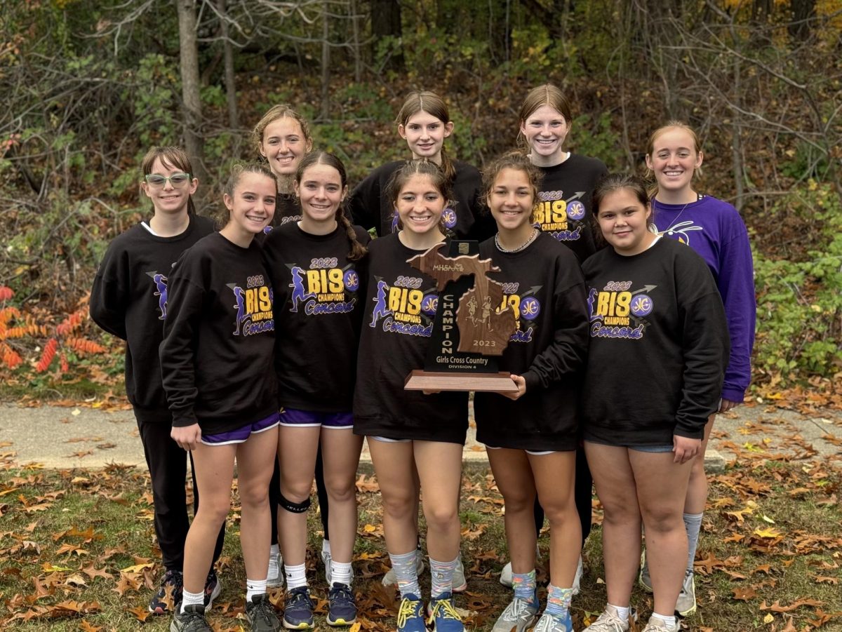 The girls cross country team holding their regional trophy!

Photo courtesty of Wes Stevens.