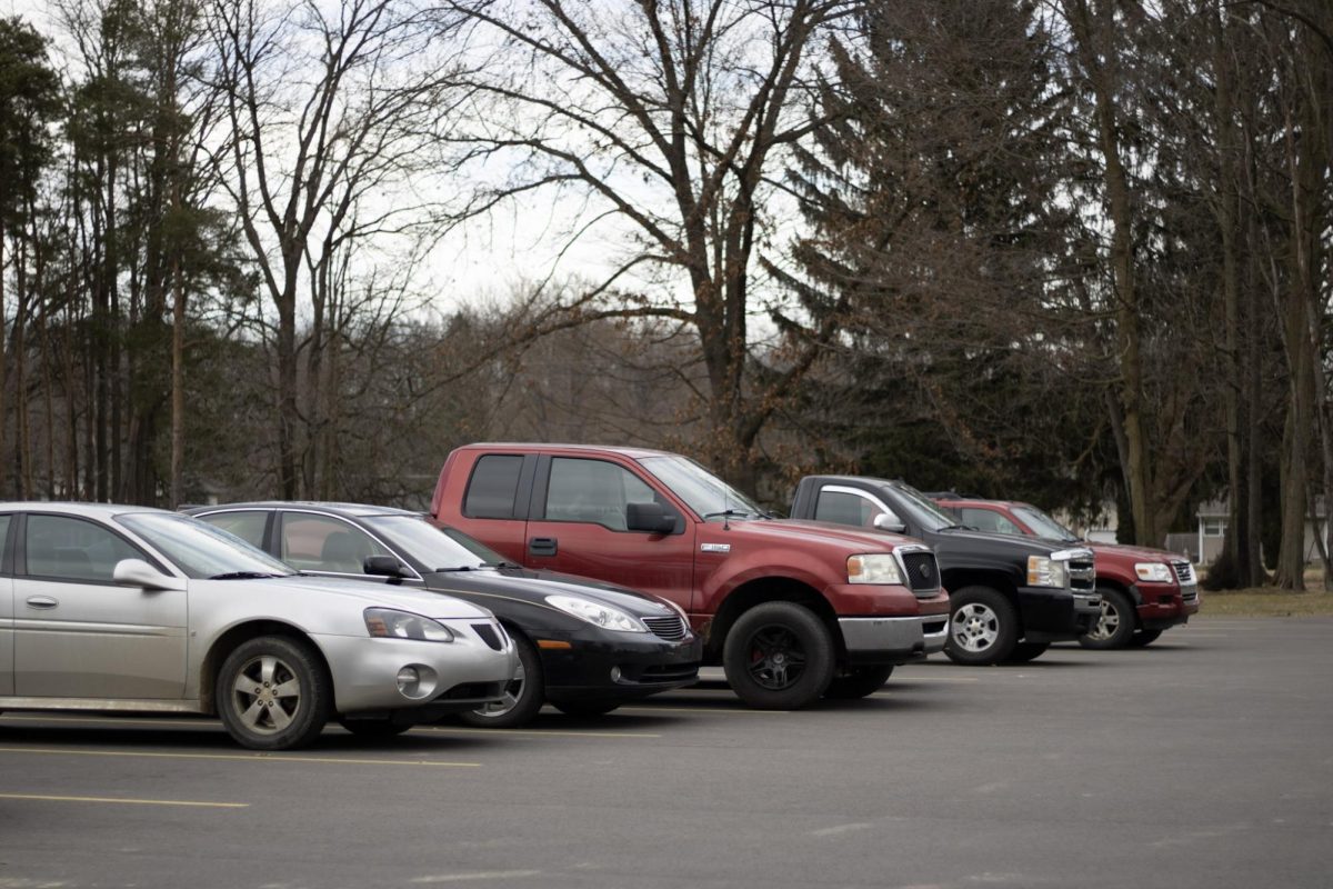 The CHS student parking lot has a few vehicles, but the cost of drivers education impacts the percentage of students who can drive to school. 