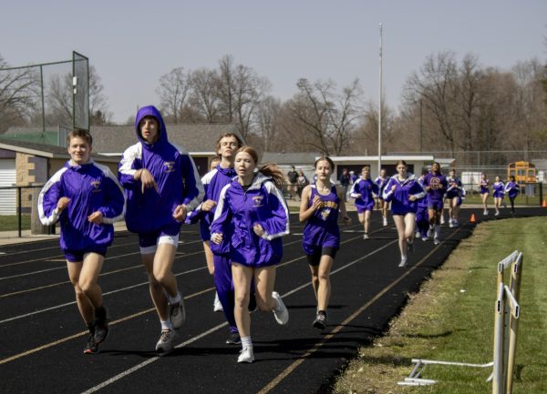 Concords boys and girls track team warming up before the meet