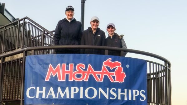 Grace Thorrez, Pyper Norris, and Hannah Stimer pose for a photo at the state tournament. 