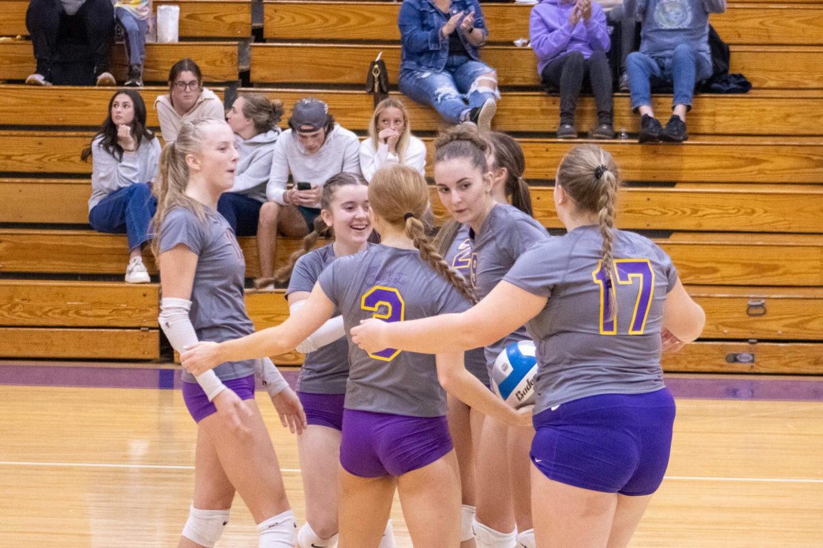 Varsity celebrates another point in their game vs. Stockbridge.  