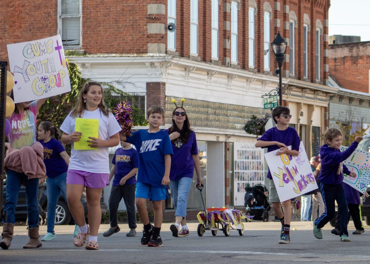 Members of the community walking in the parade