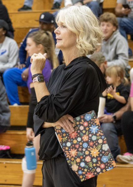 Lehman coaching during the dig pink game.