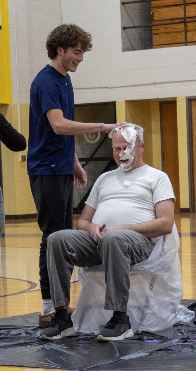 Gavin Riske pieing Mr. Couling 