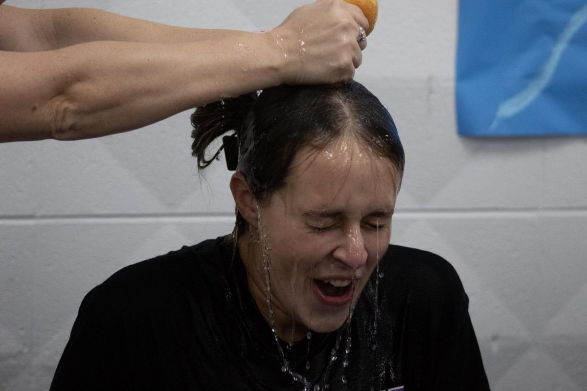 Grace Thorrez getting soaked in "Soak a senior"