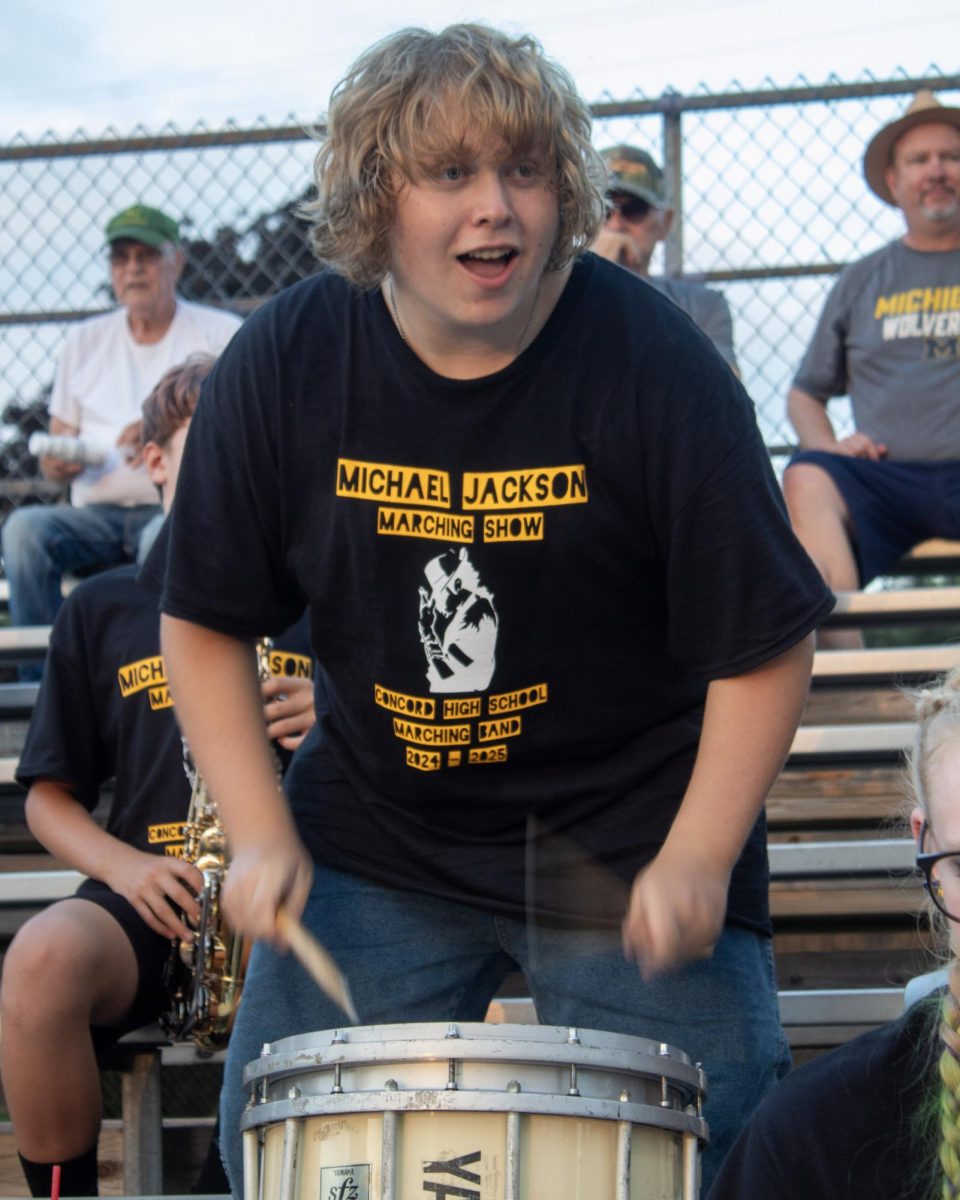 Jayden during marching band at a football game.