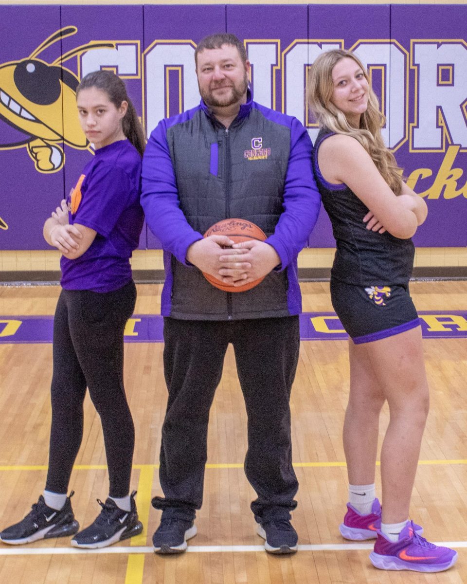 Arbuckle with his two daughters, Avery and Reagan.