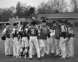 The team talking before heading back out to play