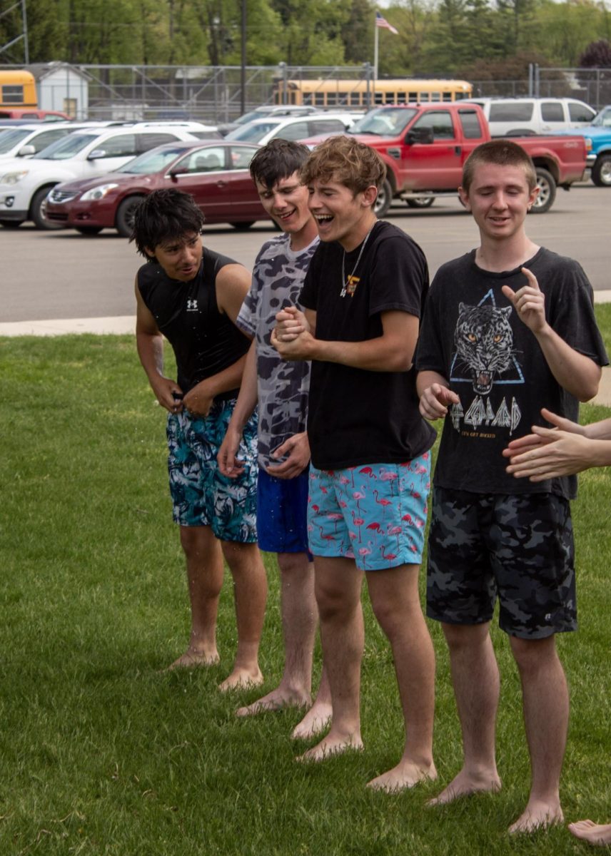 Senior boys after being soaked!