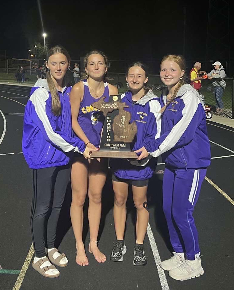 Bradie, Annie, Hannah, and Ciera holding the regional trophy!