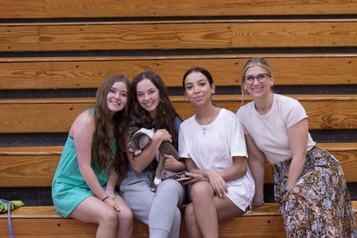 Macy Sinden, Liliana Vandenburg, Mina Sloan, and Mrs. O holding "Fred".