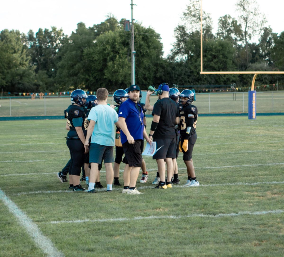 The football team getting ready to play the Spartans.