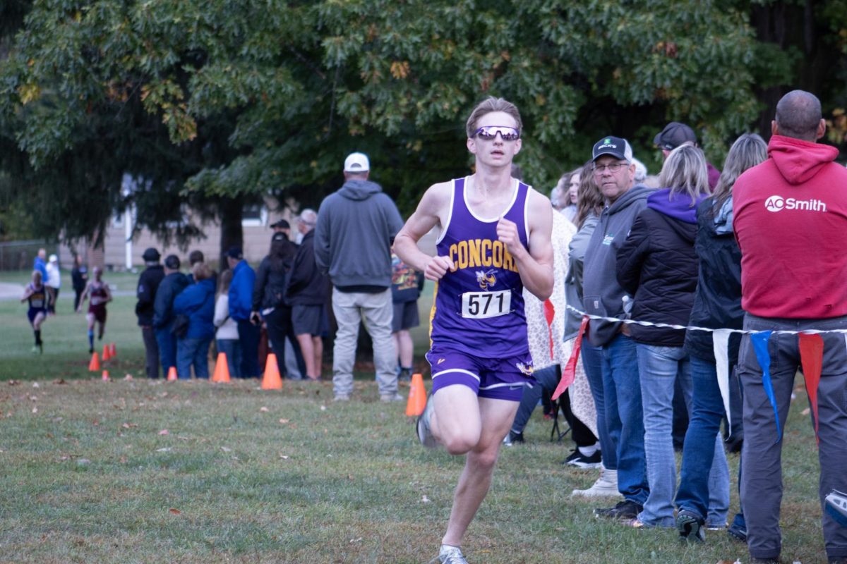 Maddox Hutchinson crossing the finish line.