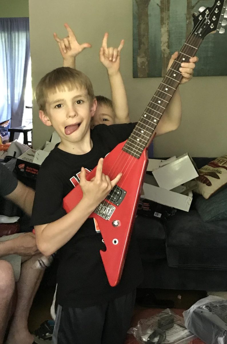 Future Grammy winner, Maddox Hutchinson practicing his mad guitar skills 