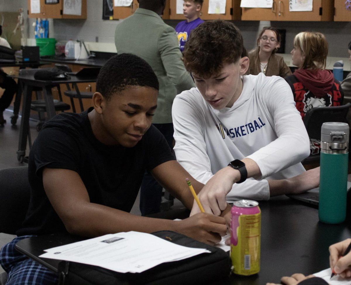 Zack Stevens working with JJ Davis-Bailey.