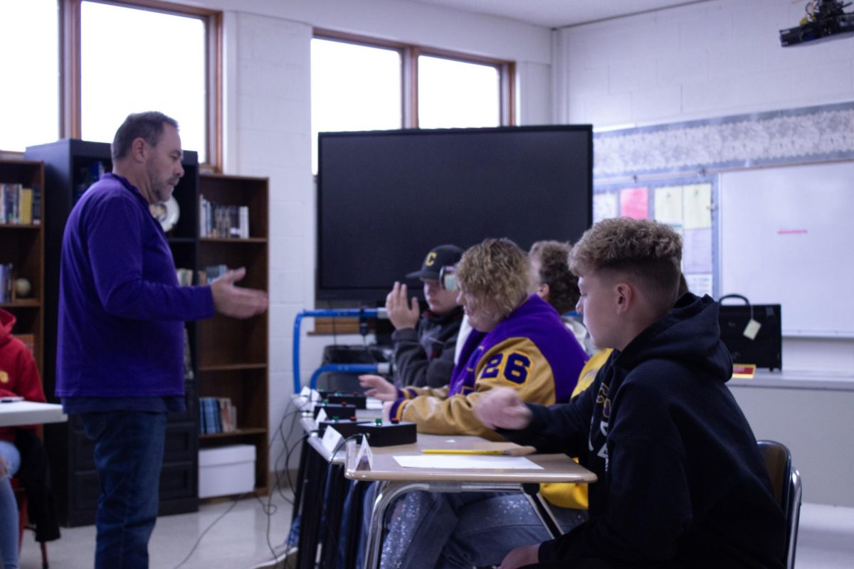 Mr.Reiniche giving advice to his team