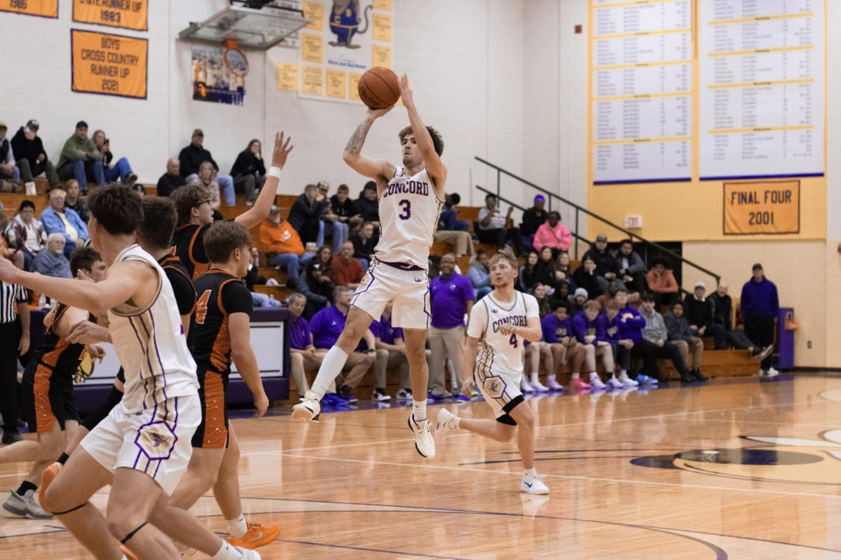 Jett Smith shooting a jump shot.