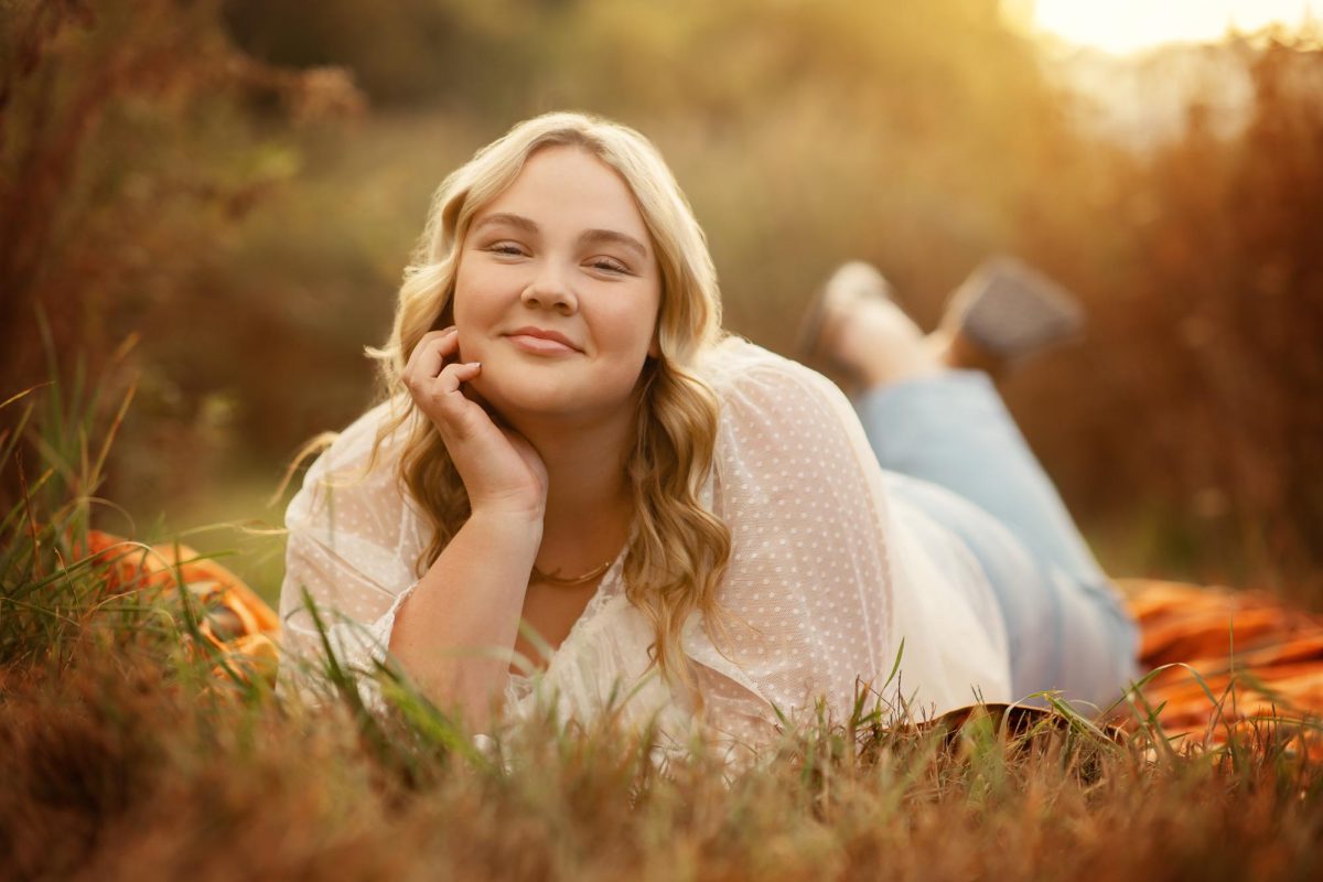 Bella posing for her senior photos.

Photo provided.