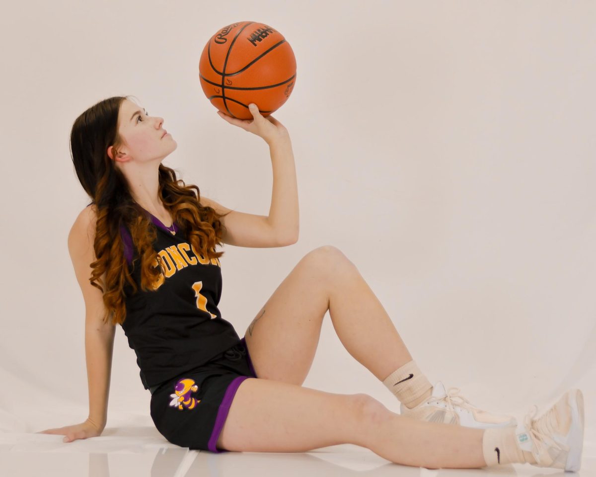 Herzberg poses for her senior basketball photos. 