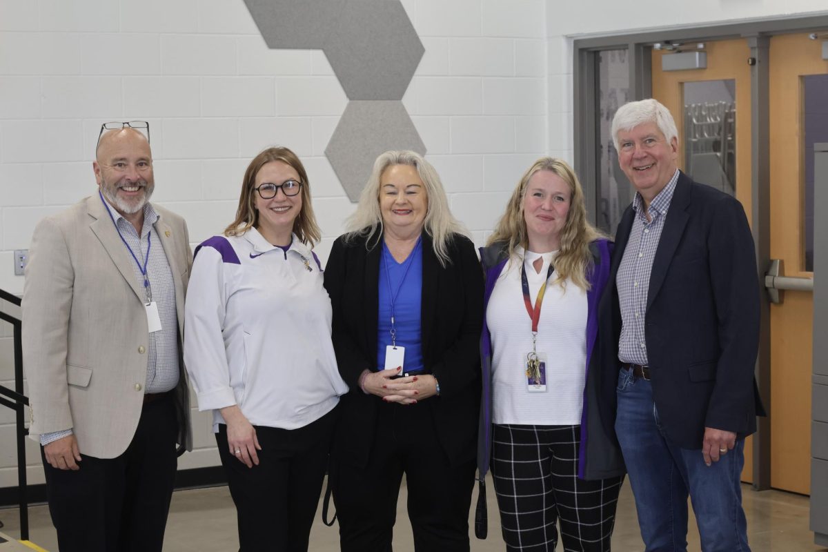 Representative Steve Frisbie, Superintendent Rebecca Hutchinson, Representative Kathy Schmaltz, Mrs. Snyder, and former Governor Rick Snyder. 
