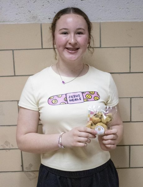 Estee Herendeen showing off her amazing homemade chocolate chip cookies.