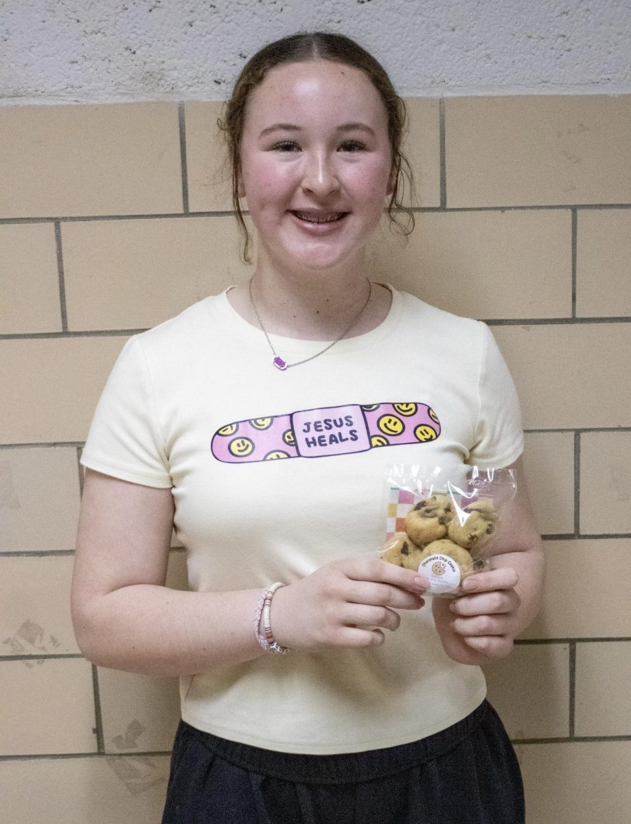 Estee Herendeen showing off her amazing homemade chocolate chip cookies.