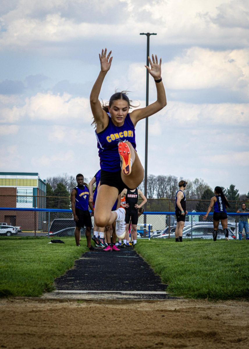 Addison Riske performing long jump