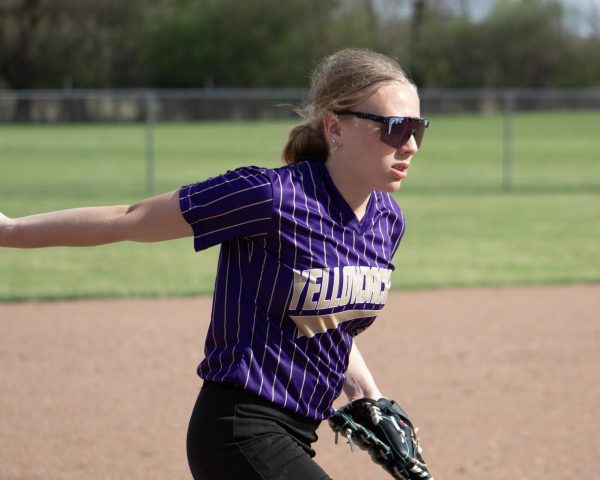 Audrey Rinehart warming up before pitching.